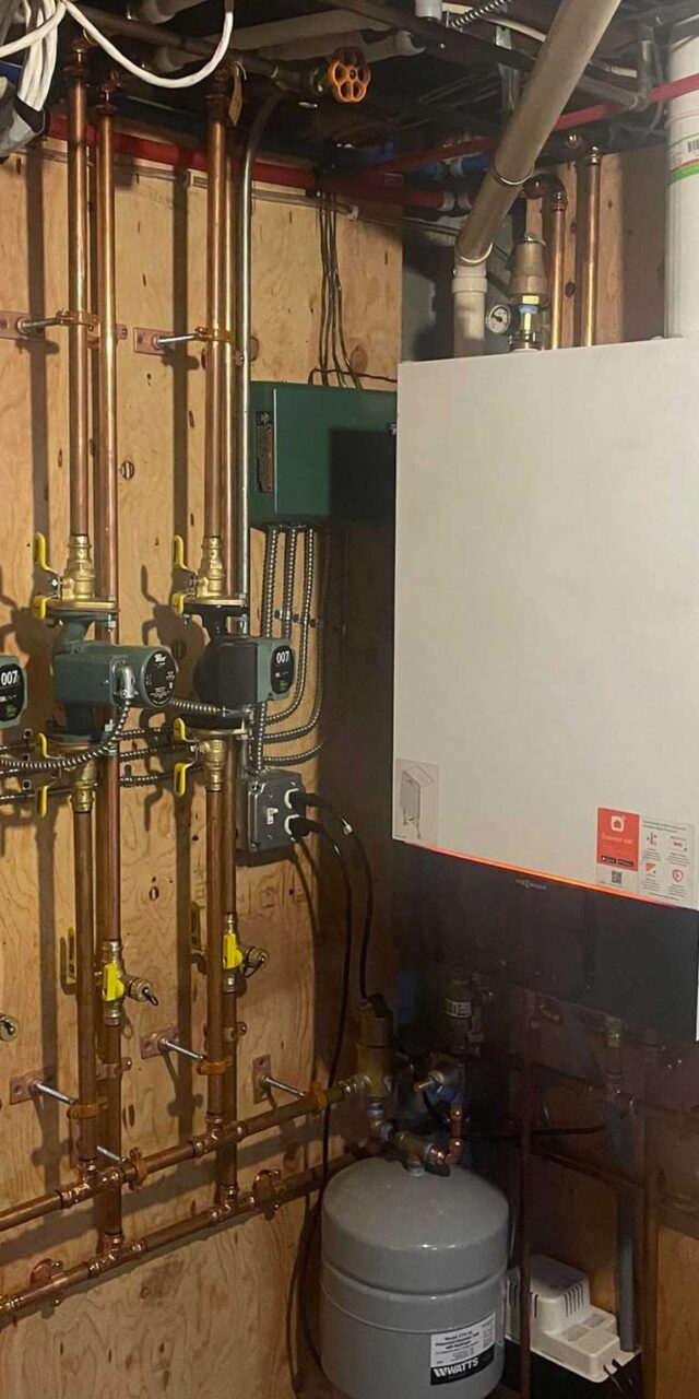 Viessmann tankless boiler installed in a Quincy, MA home by Johnson Bros. Plumbing & Drain Cleaning.