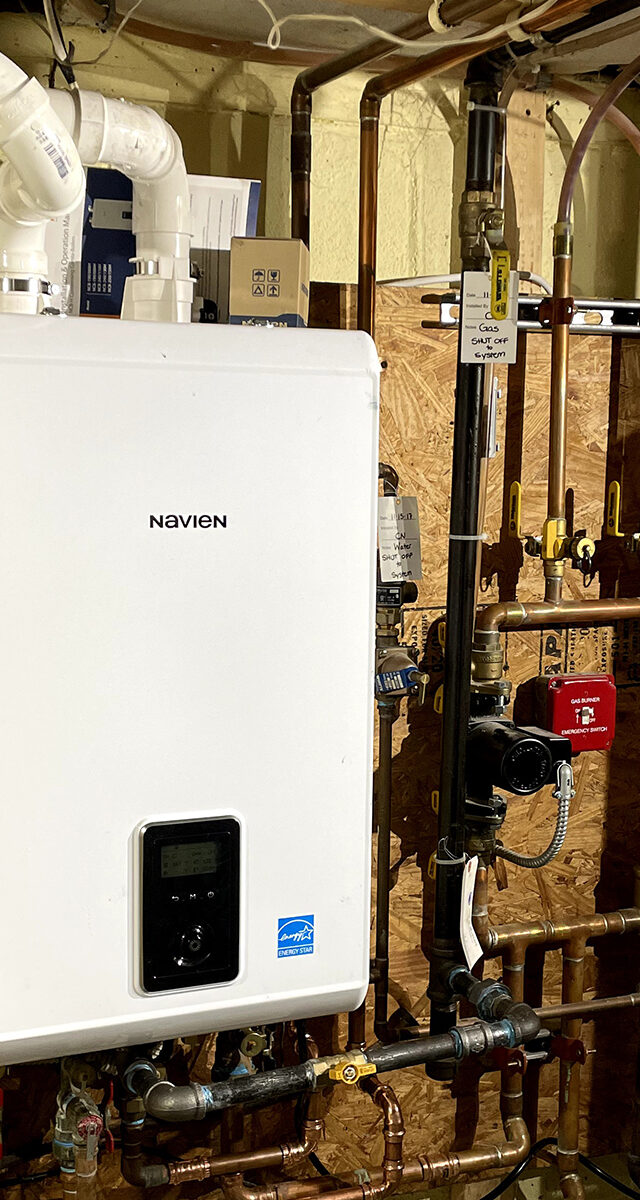 Navien tankless water heater installed in a Quincy, MA home by Johnson Bros. Plumbing & Drain Cleaning.