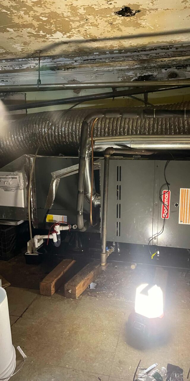 Basement furnace installation in Quincy, MA by Johnson Bros. Plumbing & Drain Cleaning, showcasing professional and energy-efficient upgrades.